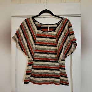 Point Flutter Sleeve Top with peek a boo holes Size Small